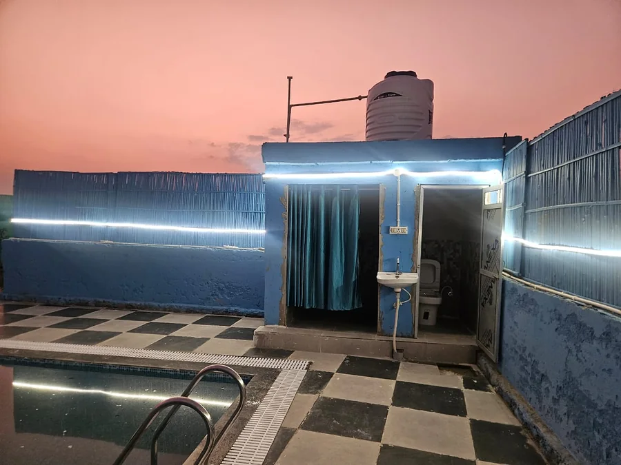 Swimming pool and poolside view at Clyrova Farmhouse