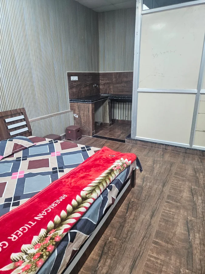 Family room wardrobe and bed view